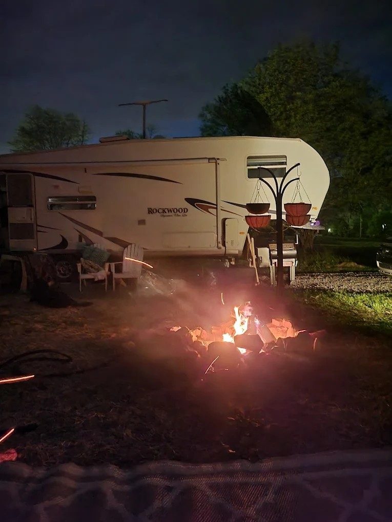 A campfire at Doe Valley Campground at night.